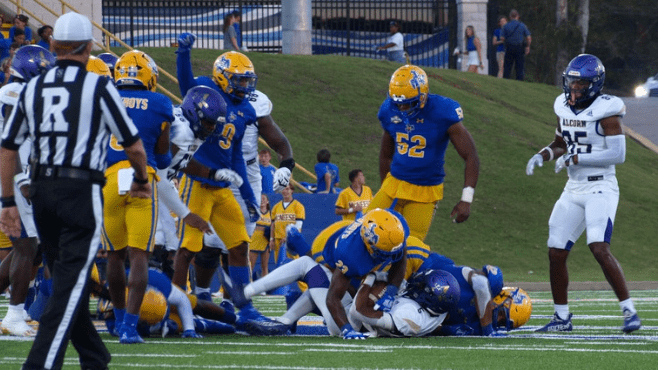 The McNeese defense bottles up Alcorn State running back during Saturday's 30-19 loss at Cowboy Stadium. -- Photo by Hannah Grace Adams